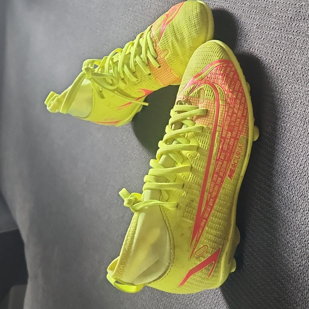 Nike Kids cleats in Neon Yellow and Pink